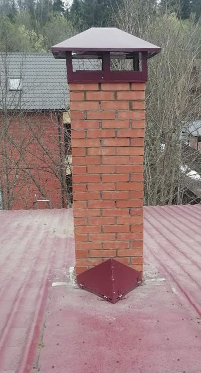 Восстановленный дымоход со снегорассекателем